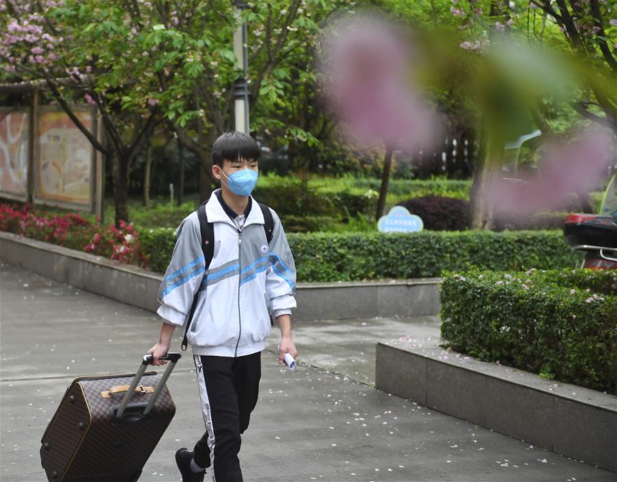 Senior high school students return to school in Bazhong City, SW China's Sichuan